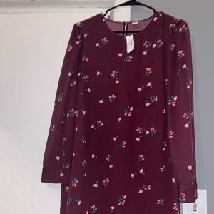 Floral old navy dress. Knee length, below the elbow. Very pretty- never worn